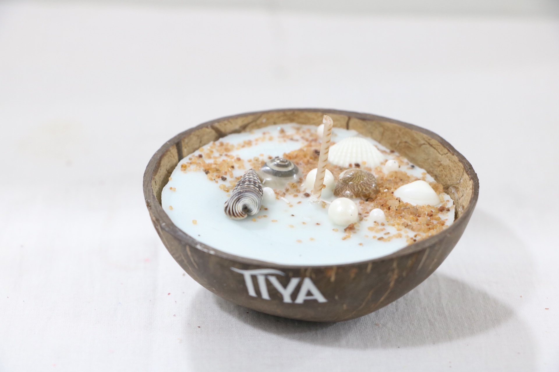 Blue Oceanic Coconut Shell Candle - Image 3